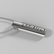 Side view of the Aggieland sterling silver oval tag pendant on a chain.